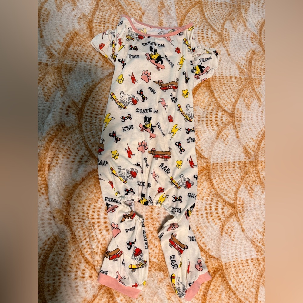 Cozy Cream Dog Onesie with Pink Trim and Skate Print - XL